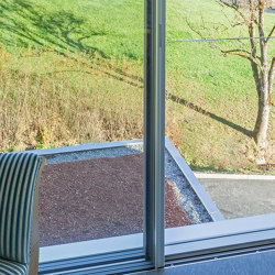 Frameless sliding windows with all-glass safety barrier | Window types | swissFineLine